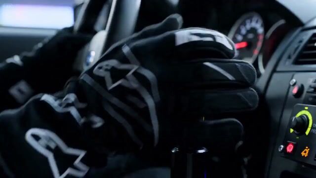 cinematic street racing sequence at night, a focused driver inside a high-performance car grips  prompt example image preview